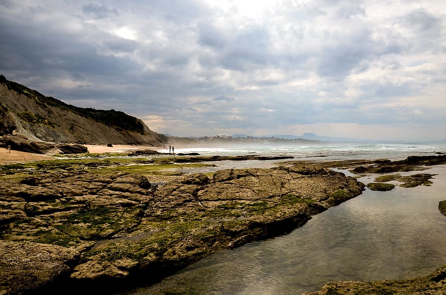 sea, ocean, water, waves, nature, coast, rock, horizon, people HD wallpaper