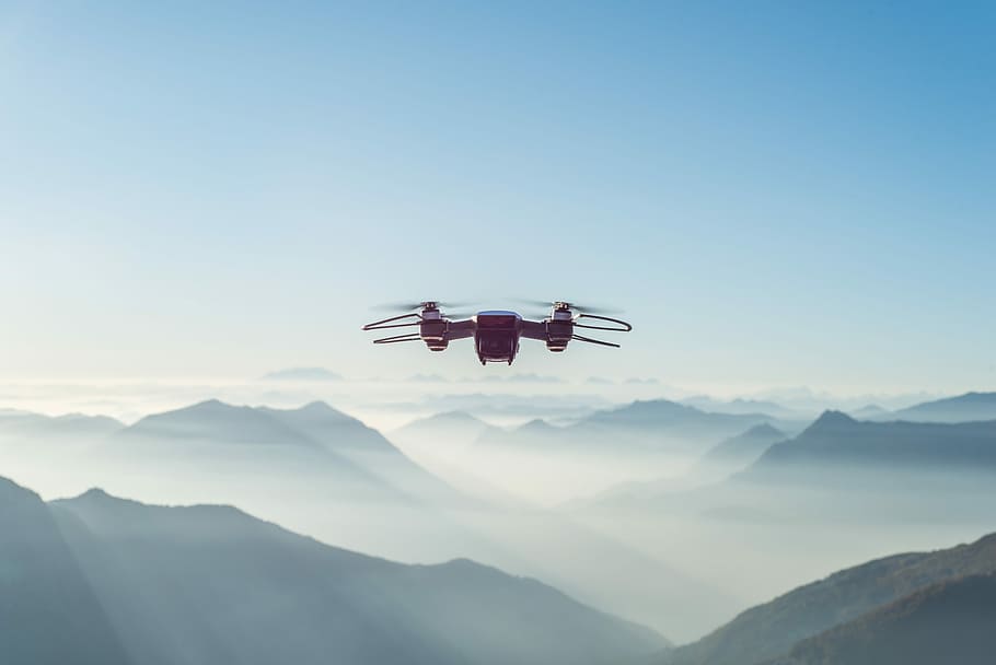 turned-on drone, black drone quadcopter flying during daytime HD wallpaper