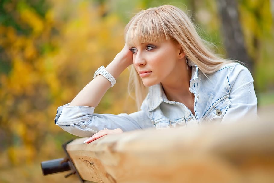 selective focus photography of woman wearing blue denim button-up jacket, HD wallpaper