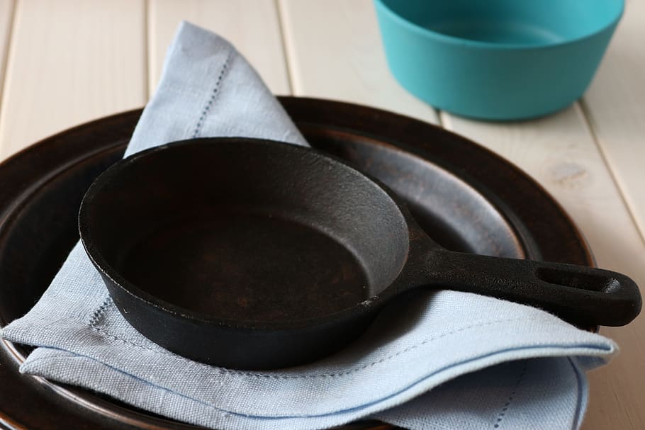 black frying pan on gray textile, props, pot, cooking, kitchen utensil HD wallpaper