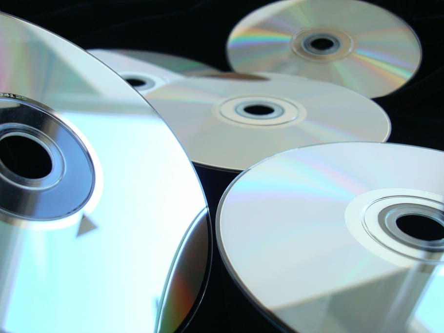 several compact discs, compact disk, dee dee buoy, blu-ray, media, HD wallpaper