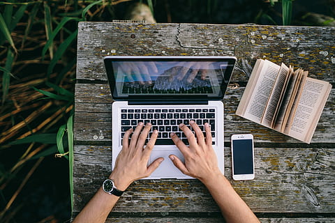 Man working on Macbook at lake, workspace, workplace, computer HD wallpaper