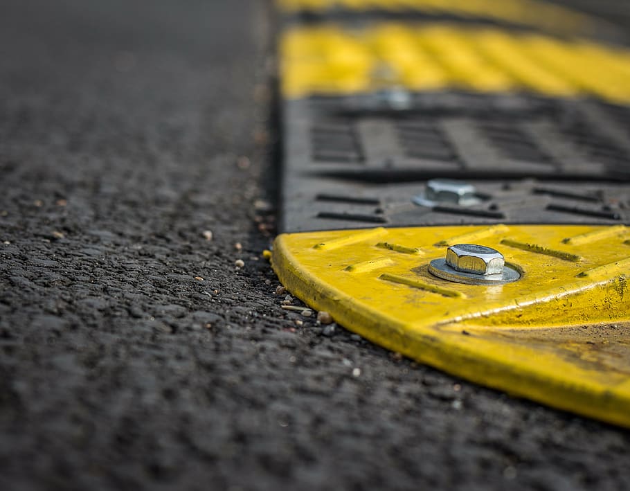 close-up photo of yellow and black metal covers, retarder, screw HD wallpaper
