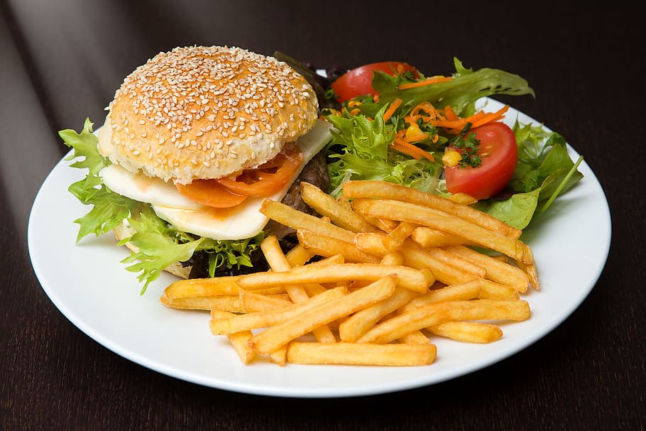 hamburger and fries with sliced tomato and lettuce filled white plate, HD wallpaper