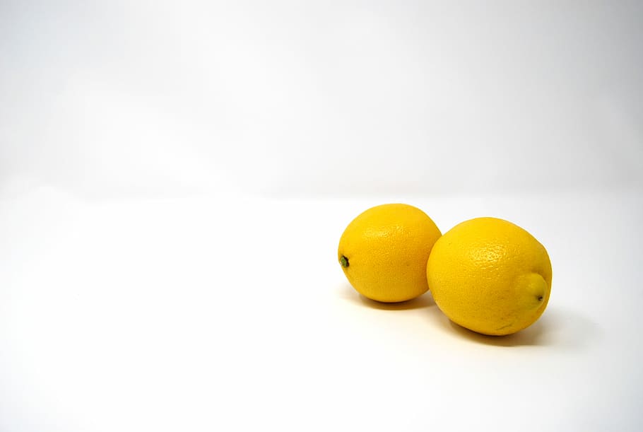 two yellow lemons, two ripe lemons on white surface, minimal, HD wallpaper