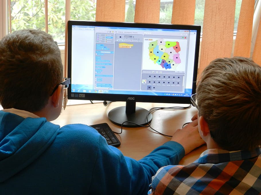 two boy playing computer beside clear glass window, the student HD wallpaper