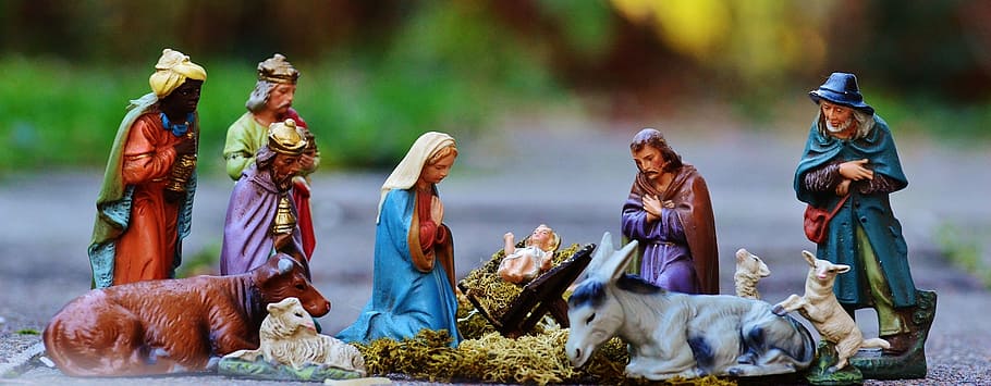 selective focus photography of The Nativity figurines, christmas crib figures