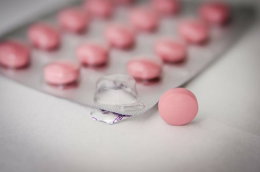 selective focus photography of pink medication pill, medications HD wallpaper