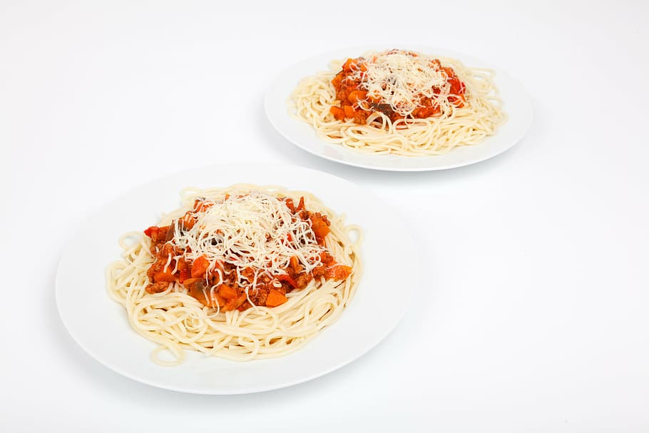 two plates of cooked spaghetti, beef, cheese, cuisine, delicious