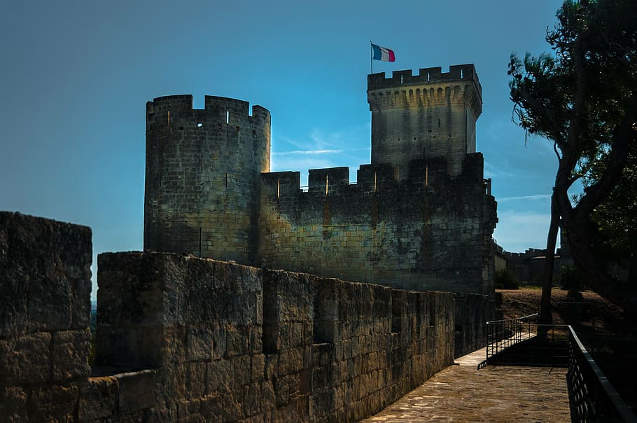 grey castle with flag landscape photography at daytime, beaucaire HD wallpaper