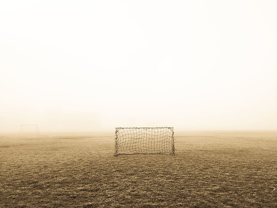 soccer goal on brown field, black soccer net in the middle of the desert, HD wallpaper