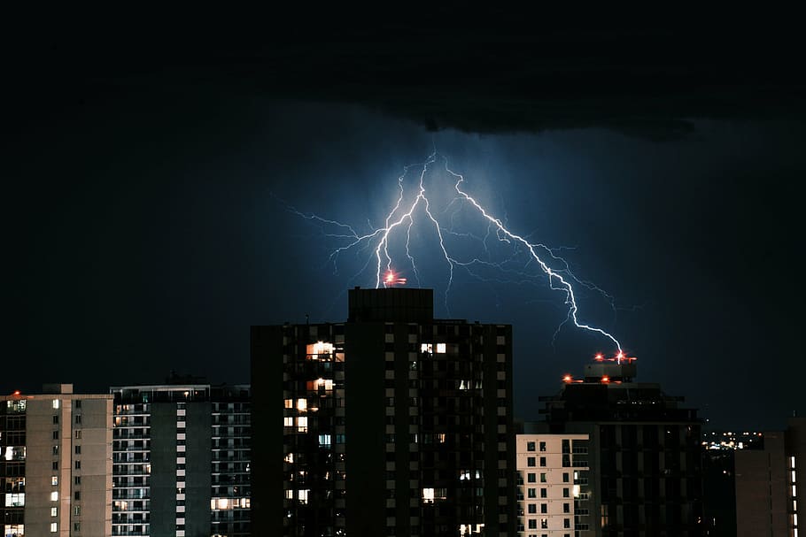 lightning striking buildings during nighttime, high, rise, architecture HD wallpaper