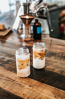 Glass Mason Jar With Ice Coffee On Wood Table Selective Focus On