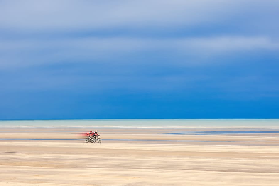 two person biking on brown sand surface painting, abstract HD wallpaper