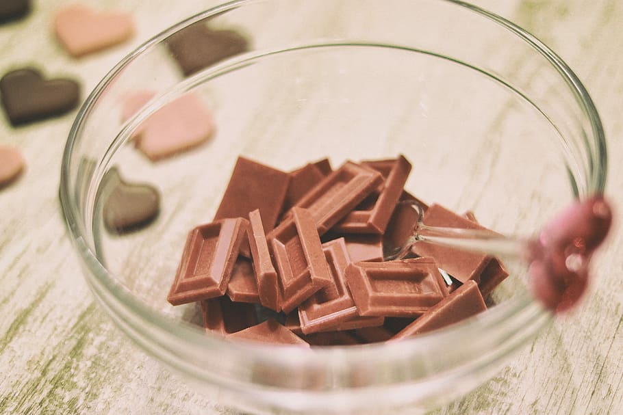 closeup photo of chocolate bar in clear glass bowl, food, close-up HD wallpaper