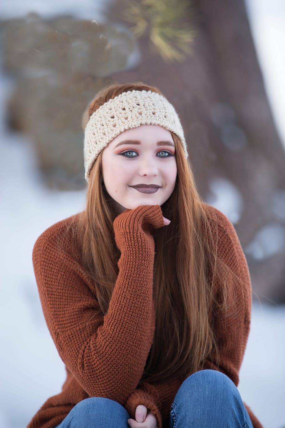 woman smiling wearing brown sweater, beautiful, redhead, winter