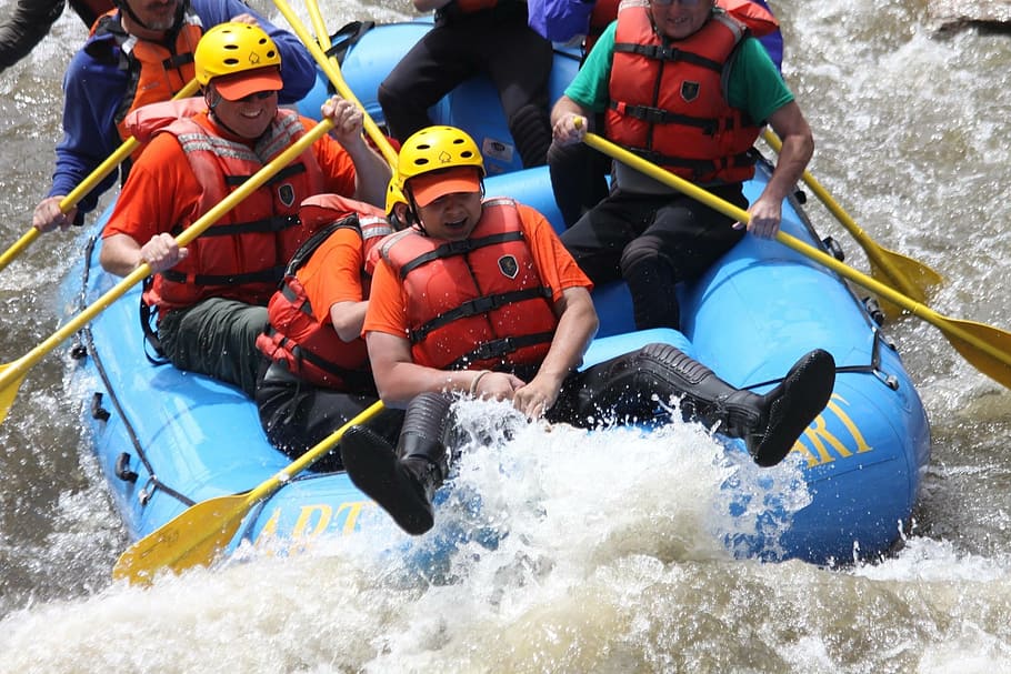 people riding boat white rafting on water stream, river, adventure