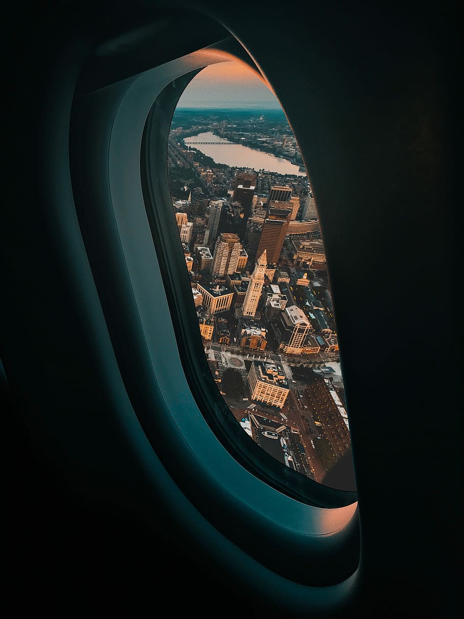 view of city buildings from plane window, aerial photography of houses and buildings HD wallpaper