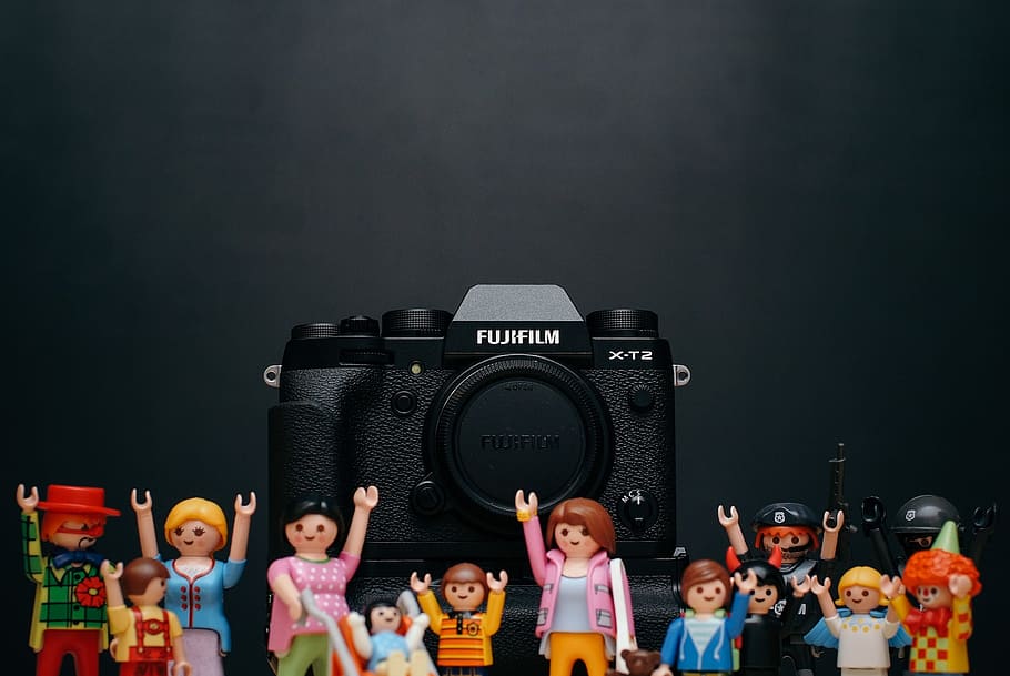 black Fujifilm camera body with minecraft toy lot, black Fujifilm camera and assorted toys HD wallpaper