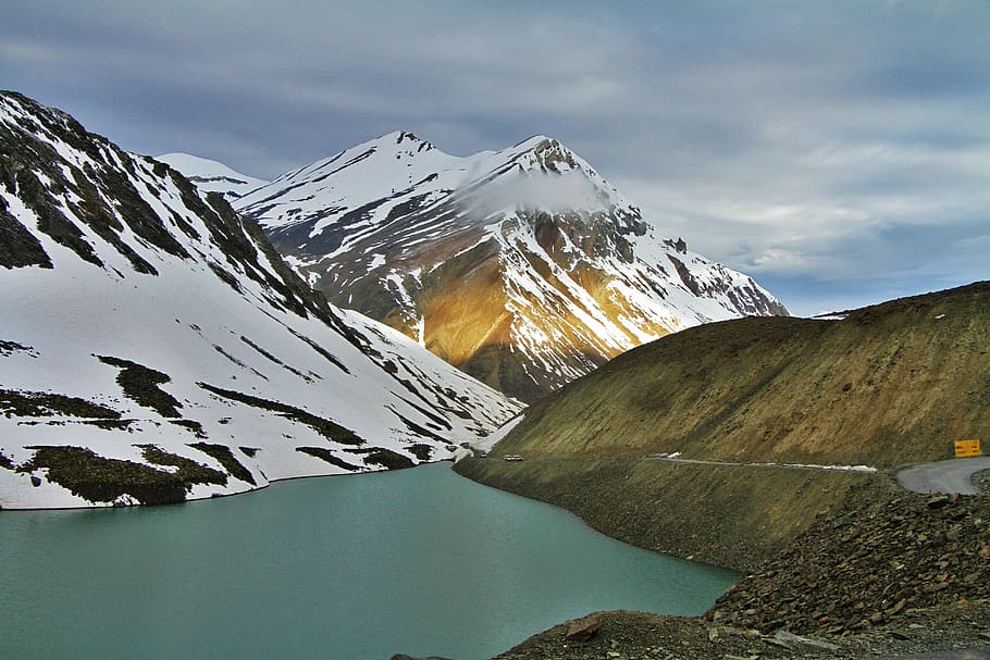 mountain covered by snow during daytime, body of water near snow-covered mountain during daytime HD wallpaper