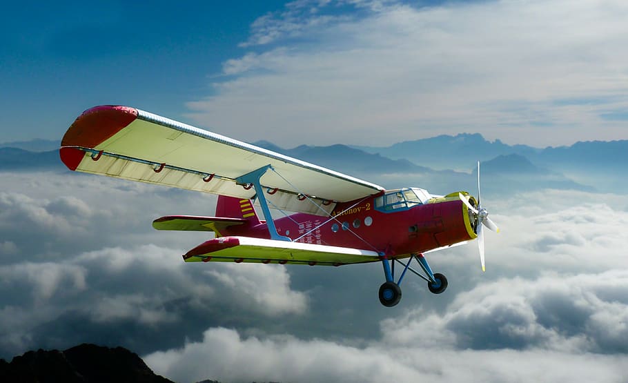 red and white biplane flying over sea of clouds, aircraft, double decker HD wallpaper