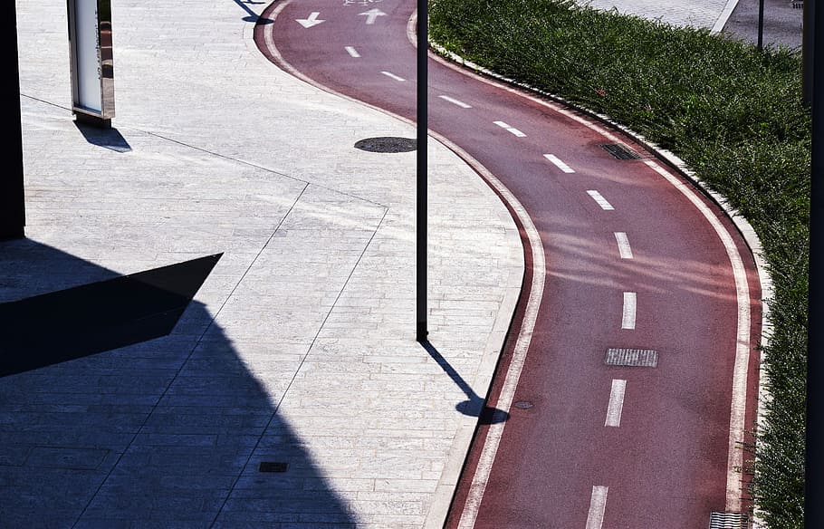 aerial photography of road, maroon and white line curved road HD wallpaper