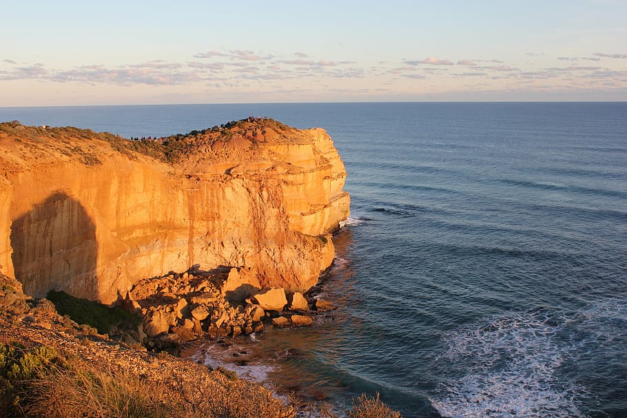 brown plateau beside sea at daytime, australia, 12 apostles, victoria
