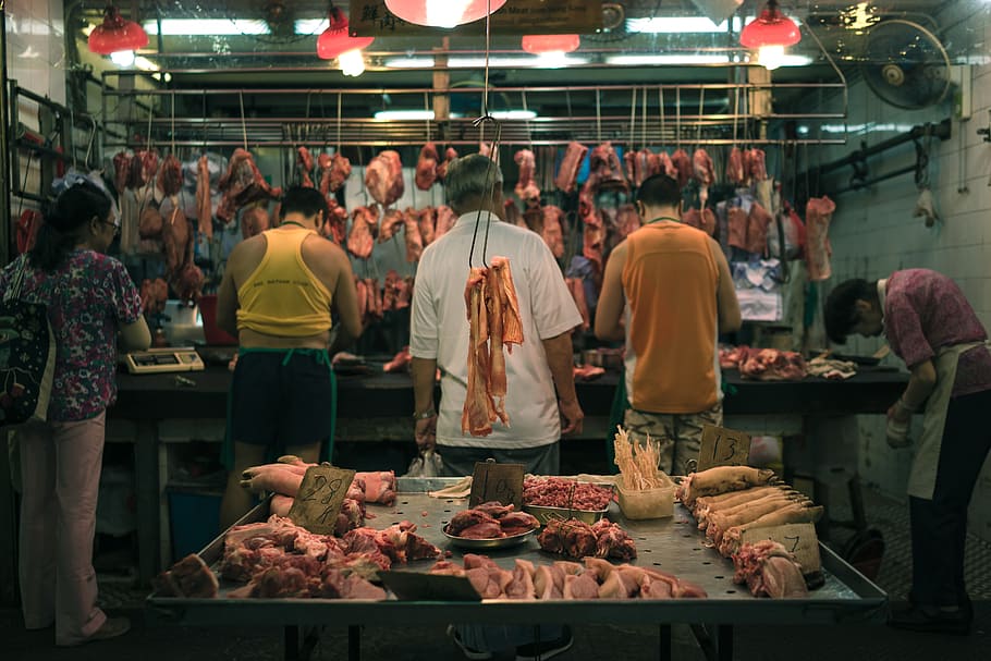 raw meat display behind five person, raw meat lot, group of people HD wallpaper