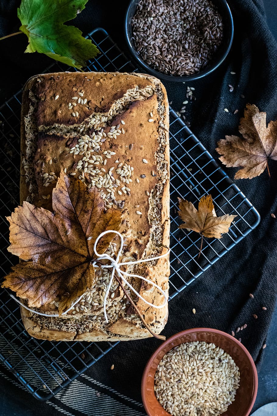 brown leaf, brown bread with sesame seeds, loaf of bread, cooling rack HD wallpaper