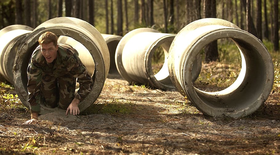 man crawling in tube, soldier, obstacle, course, military, male