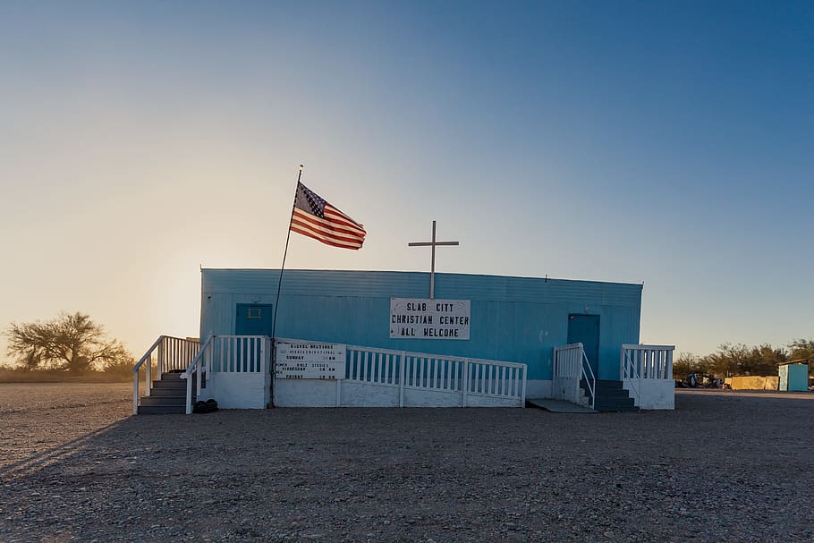 blue concrete building with USA flag, U.S.A Flag near blue painted house HD wallpaper