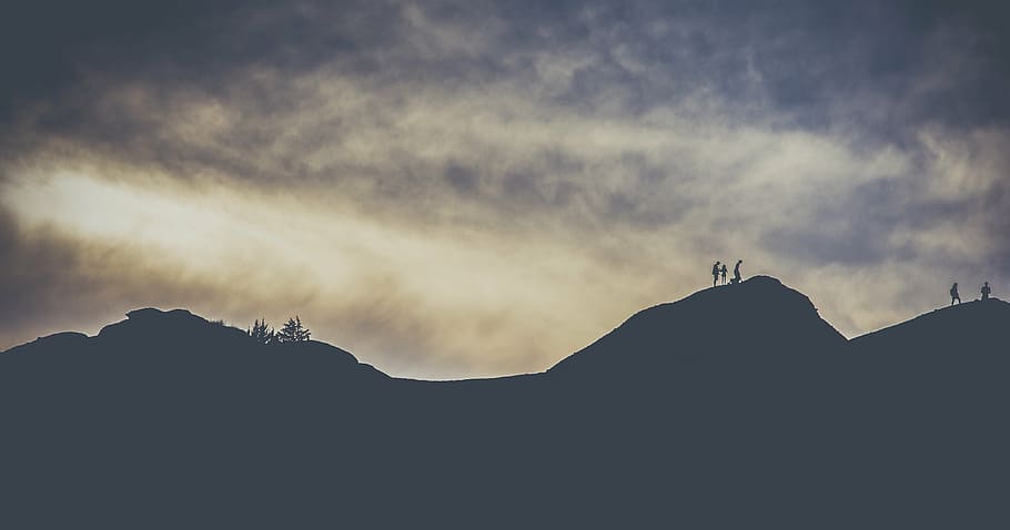 silhouette photo of land formation, adventure, clouds, dawn HD wallpaper