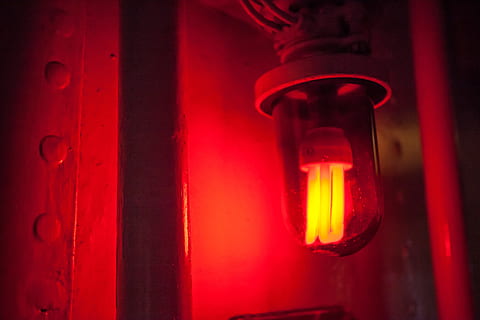 Close-up shot of on old red light at Chatham Dockyard in Kent, Southern England. Image captured with a Canon 5D DSLR HD wallpaper