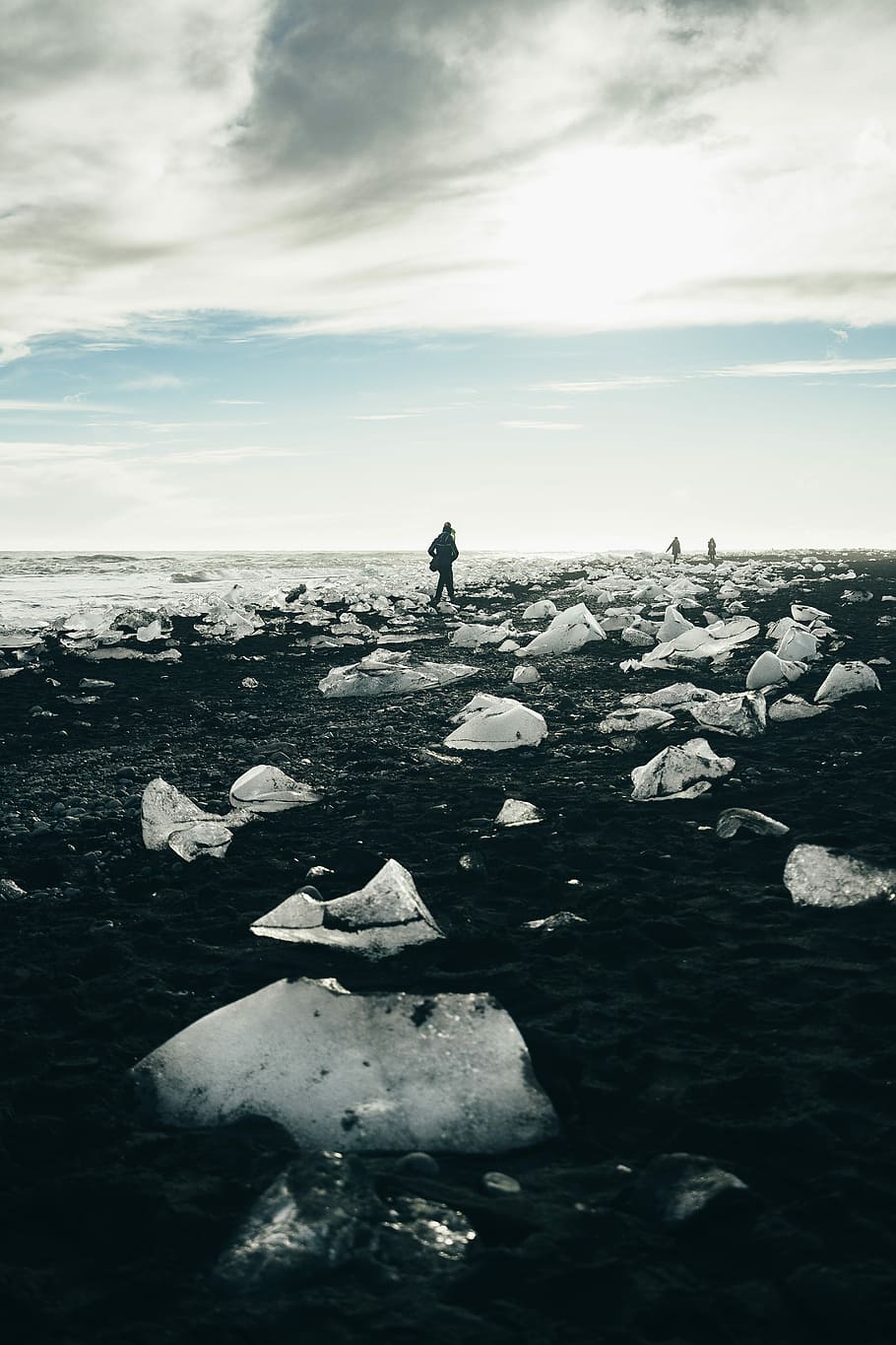 person walking beside body of water during daytime, untitled HD wallpaper