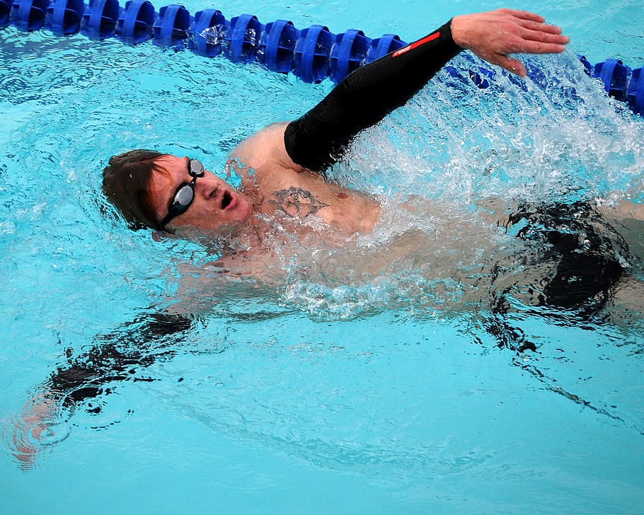 man swimming in Olympic pool, Swimmer, Backstroke, competition
