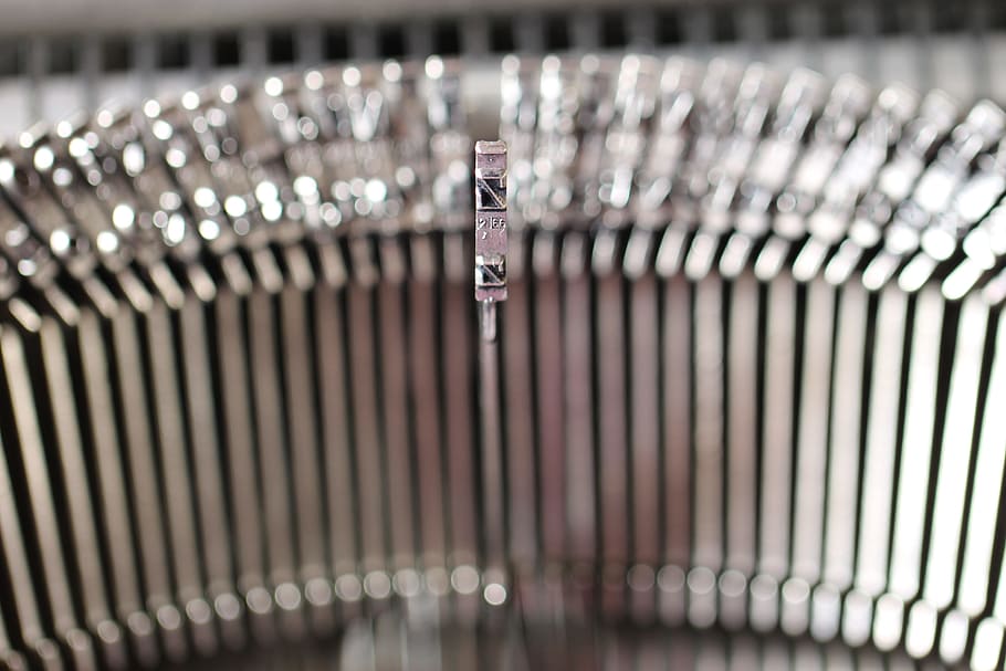 shallow depth of field photo of gray typewriter letter rod HD wallpaper