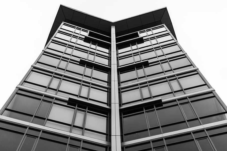 low-angle photography of grey and black building, architecture HD wallpaper