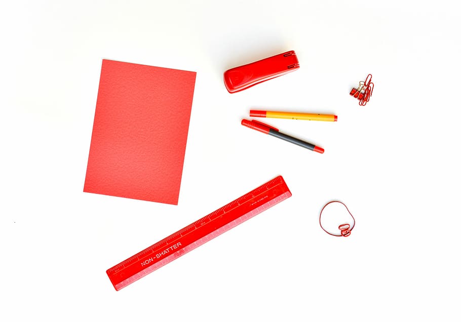 red paper, stapler, two pens, and one box, school supplies HD wallpaper