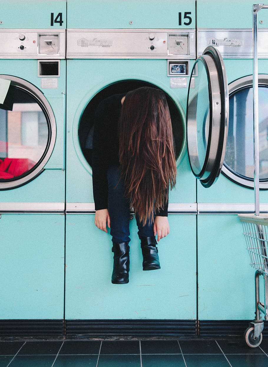 Bucktown Bubbles, woman sitting on front-load washing machine