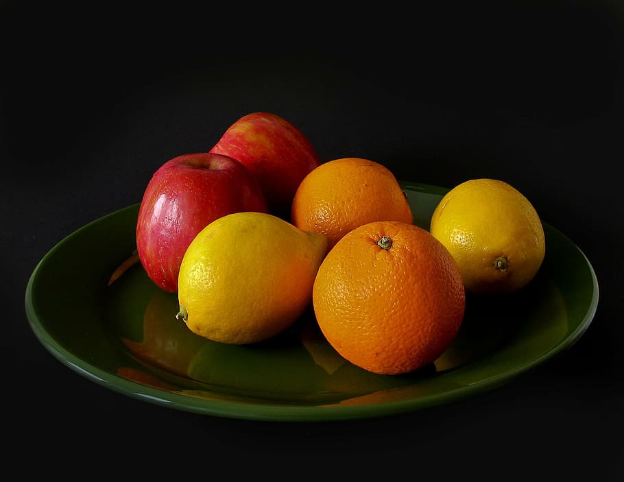 four orange fruits and two honeycrisp apple fruits on clear glass plate HD wallpaper