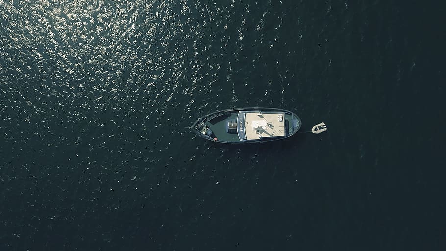 aerial photography of sailing boat in water, top view of boat on body of water during daytime HD wallpaper