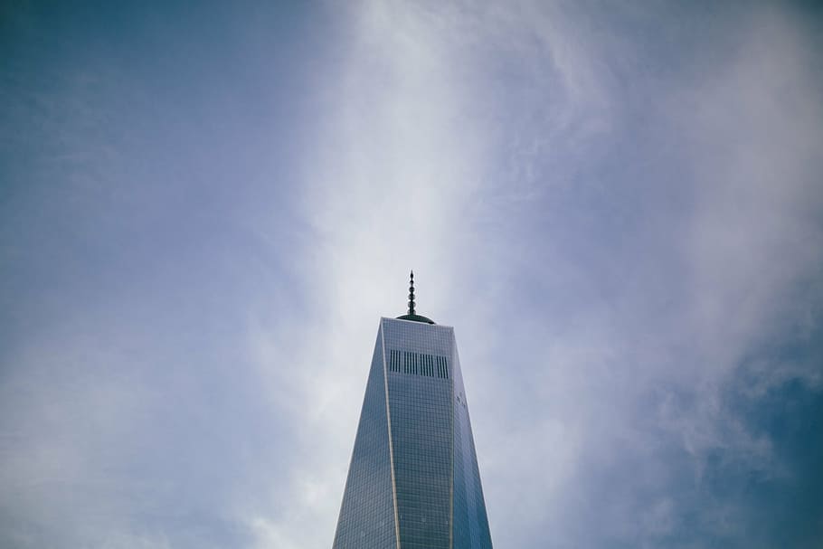 worm's eye view of building under blue sky during daytime, person HD wallpaper