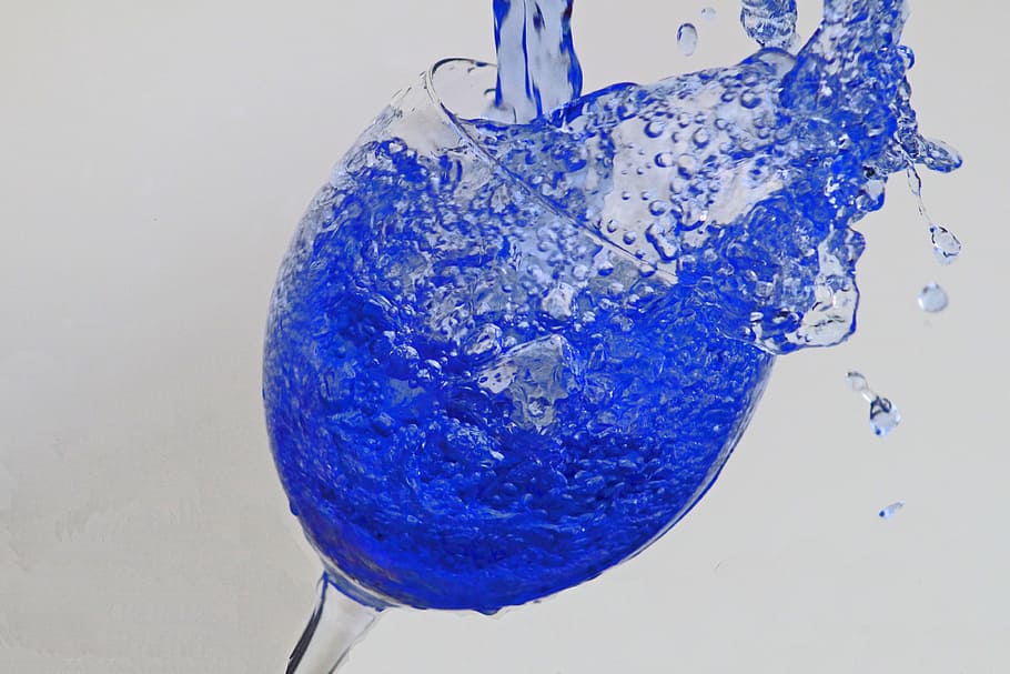 clear wine glass with blue liquid, drip, ink, spray, planet earth