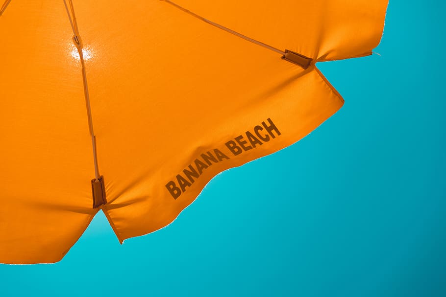 orange banana beach-printed umbrella, Banana Beach umbrella under sunlight HD wallpaper