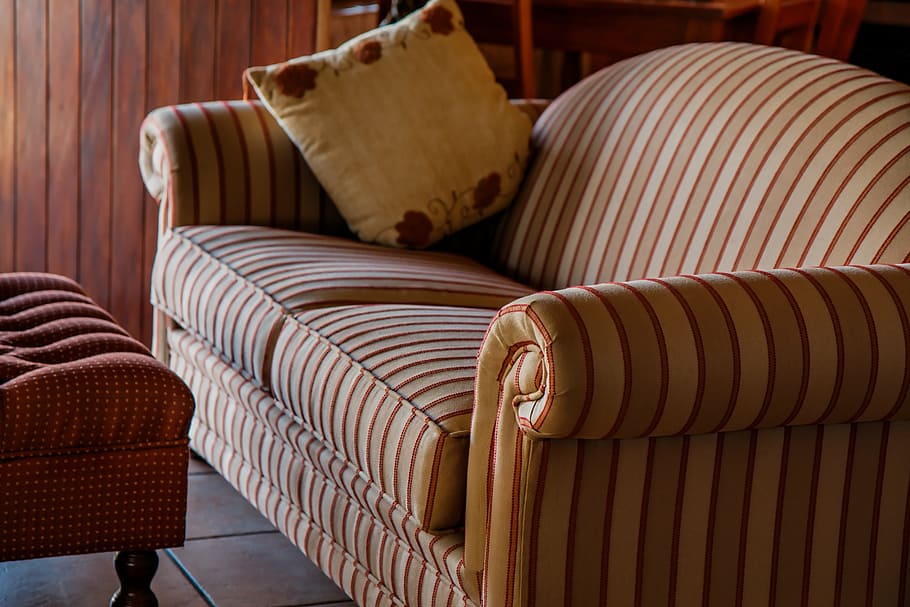 white and brown striped couch and white throw pillow on top HD wallpaper
