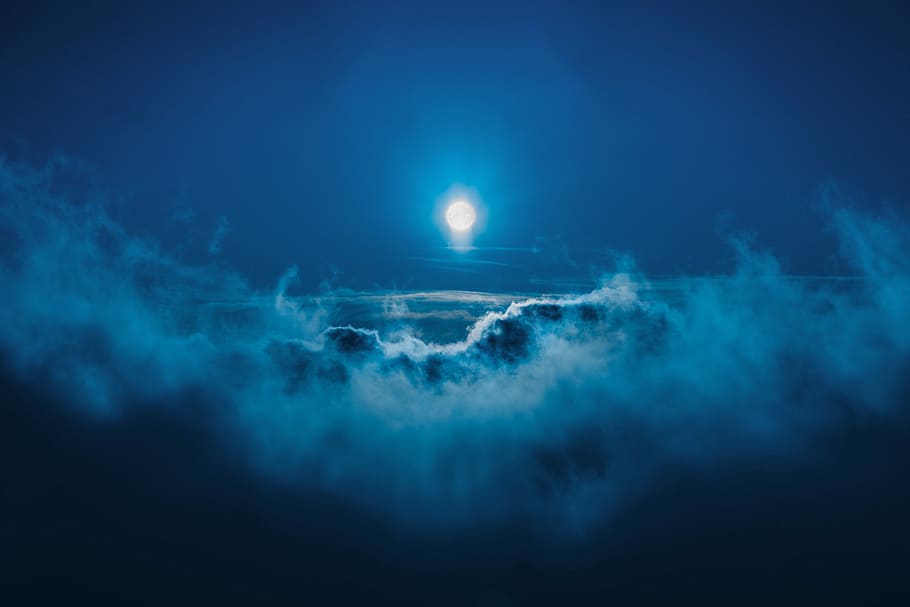 full moon along clouds, full moon surrounded with blue clouds