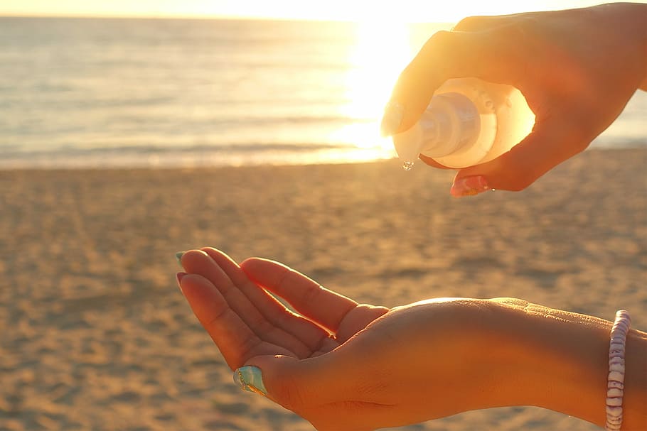 person holding push bottle, beach, sea, summer, vacations, outdoors HD wallpaper