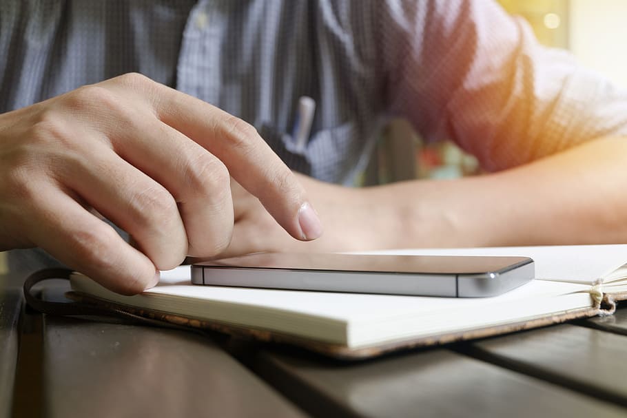 man, person, hands, smartphone, connection, desk, electronics HD wallpaper