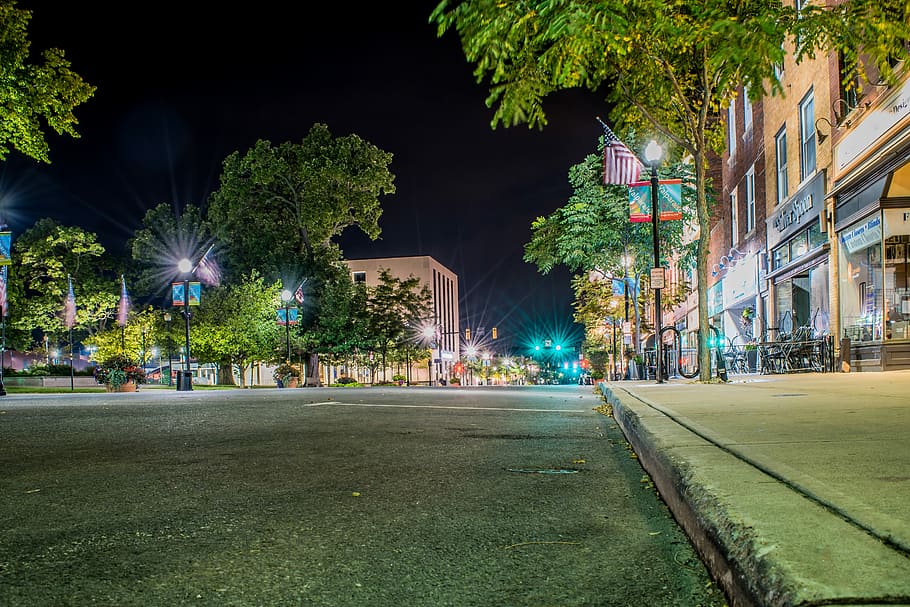 worm's-eye view of building with ligts, empty concrete road, streetscape HD wallpaper
