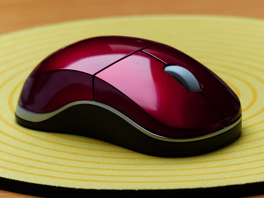 red wireless computer mouse on mouse pad, input device, peripheral